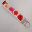 Pink orange yellow and red flower key fob wristlet