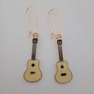Gold and cream enamel guitar charm earrings