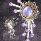 Vintage rhinestone flower pin purple center stone & rhinestones