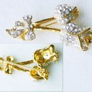 Rhinestone double flower pin gold tone setting bow at base Rhinestone double flower pin gold tone setting bow at base