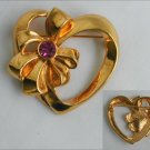 Avon heart and bow pin gold tone pink rhinestone accent