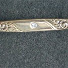 Avon bar pin rhinestone center gold tone scrolls circa 1980 s jewelry
