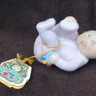 Cabbage Patch baby with rattle and tag OAA 1984 porcelain