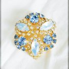 Blue and opalescent pronged rhinestone pin vintage brooch jewelry Blue and opalescent pronged rhinestone pin vintage brooch jewelry