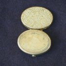 Avon glace holder vintage brass oval with metalwork Avon glace holder vintage brass oval with metalwork