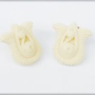 Avon cream white plastic flower shape stud earrings circa 1980s