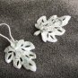 BSK clip on silver tone leaf earrings
