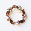 Circle rhinestone pin amber iridescent pronged stones 1 7/8" no markings