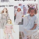 Simplicity 8843 girls dress tunic leggings sizes 8 10 12 14