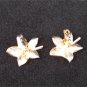 Pastelli clip leaf earrings gold tone back white enamel front vintage jewelry