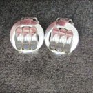 Coro earrings vintage clip on small 5/8" raised knot in circle marked jewerly