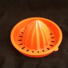 Tupperware reamer burnt orange juicer top only # 409 about 4 1/2" diameter Tupperware reamer burnt orange juicer top only # 409 about 4 1/2" diameter