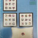 Flower Initials in cross stitch by Mary Ellen pattern booklet