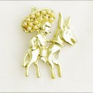 Sombrero man and donkey faux pearls gold tone setting Sombrero man and donkey faux pearls gold tone setting