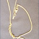 Monet thin gold tone necklace 58" long 1/32" to 1/8" wide