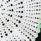 Hand crocheted doily white with green edge 12" diameter slight ruffle shell pattern Hand crocheted doily white with green edge 12" diameter slight ruffle shell pattern