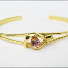 Cuff bracelet light purple center stone gold tone jewelry unmarked Cuff bracelet light purple center stone gold tone jewelry unmarked