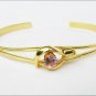 Cuff bracelet light purple center stone gold tone jewelry unmarked