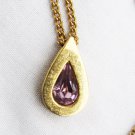 Avon pear shaped pendant with light purple stone necklace gold tone setting Avon pear shaped pendant with light purple stone necklace gold tone setting