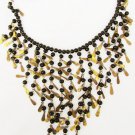 Black glass bead & brass metallic dangles necklace 23 inches hook closure Black glass bead & brass metallic dangles necklace 23 inches hook closure