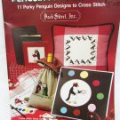 Penguin Pre-Occupations 11 cross stitch designs gone fishing artist lover family
