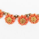 Vintage orange plastic flowers gold bead centers necklace choker unmarked Vintage orange plastic flowers gold bead centers necklace choker unmarked