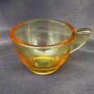 Akro Agate yellow glass cup from child tea service ribbon pattern