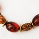 Monet choker necklace brown beads gold tone accents