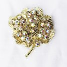 BSK iridescent rhinestone pin leaf shape gold tone BSK iridescent rhinestone pin leaf shape gold tone