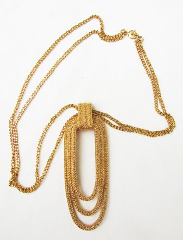 Monet gold tone double chain necklace with oval loop pendant tooled surface