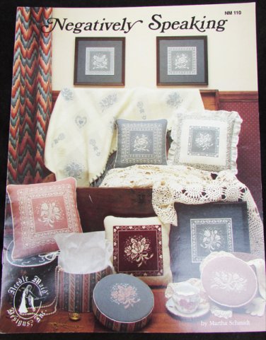 Negatively Speaking reverse image cross stitch leaflet roses flowers