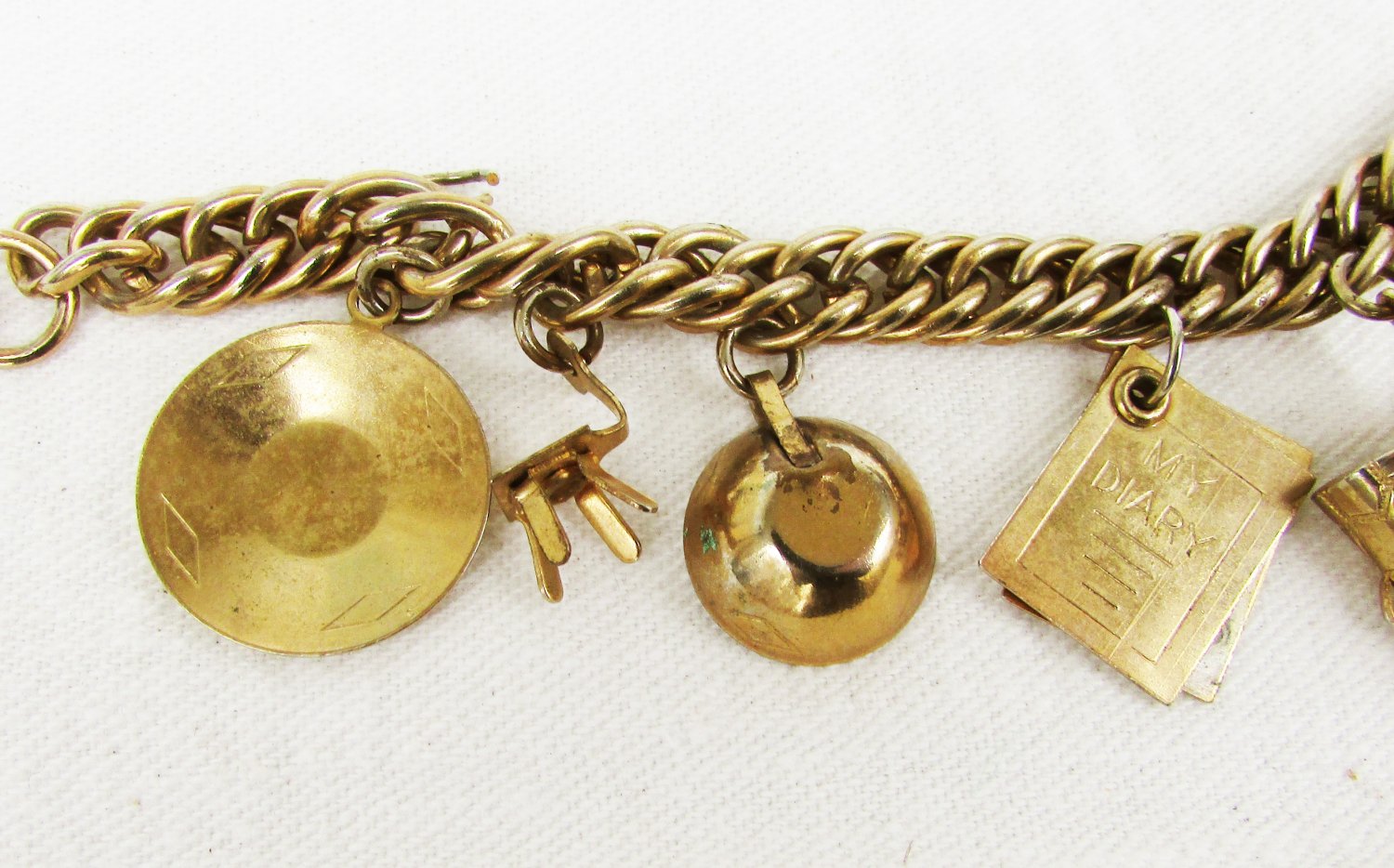 Brass charm bracelet western charms covered wagon diary ladder scissors