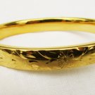 Napier hinged bracelet gold tone etched flower bangle