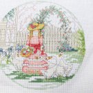 Finished cross stitch girl feeding geese round design 6 1/2" rose trellis