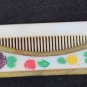 Celluloid folding comb vintage painted flowers as is small flaw for pocket purse