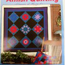 Amish Quilting House of White Birches leaflet Starburst Diamonds Tulip Beds