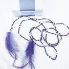 Avon beaded lariat necklace with purple feathers new in box
