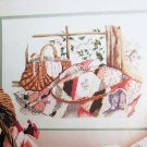 Breath of Spring quilt with basket cross stitch pattern
