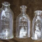 3 vintage glass baby doll bottles Edeal Effanbee & begging dog 3 vintage glass baby doll bottles Edeal Effanbee & begging dog