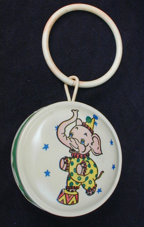 Celluloid baby rattle elephant decal round with holding ring as is