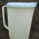 Tupperware two 2 quart pitcher 2009C-1 and blue lid 2010B-3 gentrly used Tupperware two 2 quart pitcher 2009C-1 and blue lid 2010B-3 gentrly used