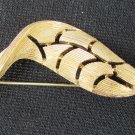 Monet gold tone pin twisted leaf fooled 3" wide