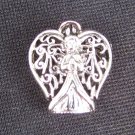 Camco silver tone angel pendant hinge opens as locket Camco silver tone angel pendant hinge opens as locket