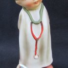 Napco Little Vet figurine SH1B boy with bandaged dog 5 1/2" tall Napco Little Vet figurine SH1B boy with bandaged dog 5 1/2" tall