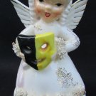 Napco October birthday angel holds Halloween mask A1370 4 1/4" tall Napco October birthday angel holds Halloween mask A1370 4 1/4" tall
