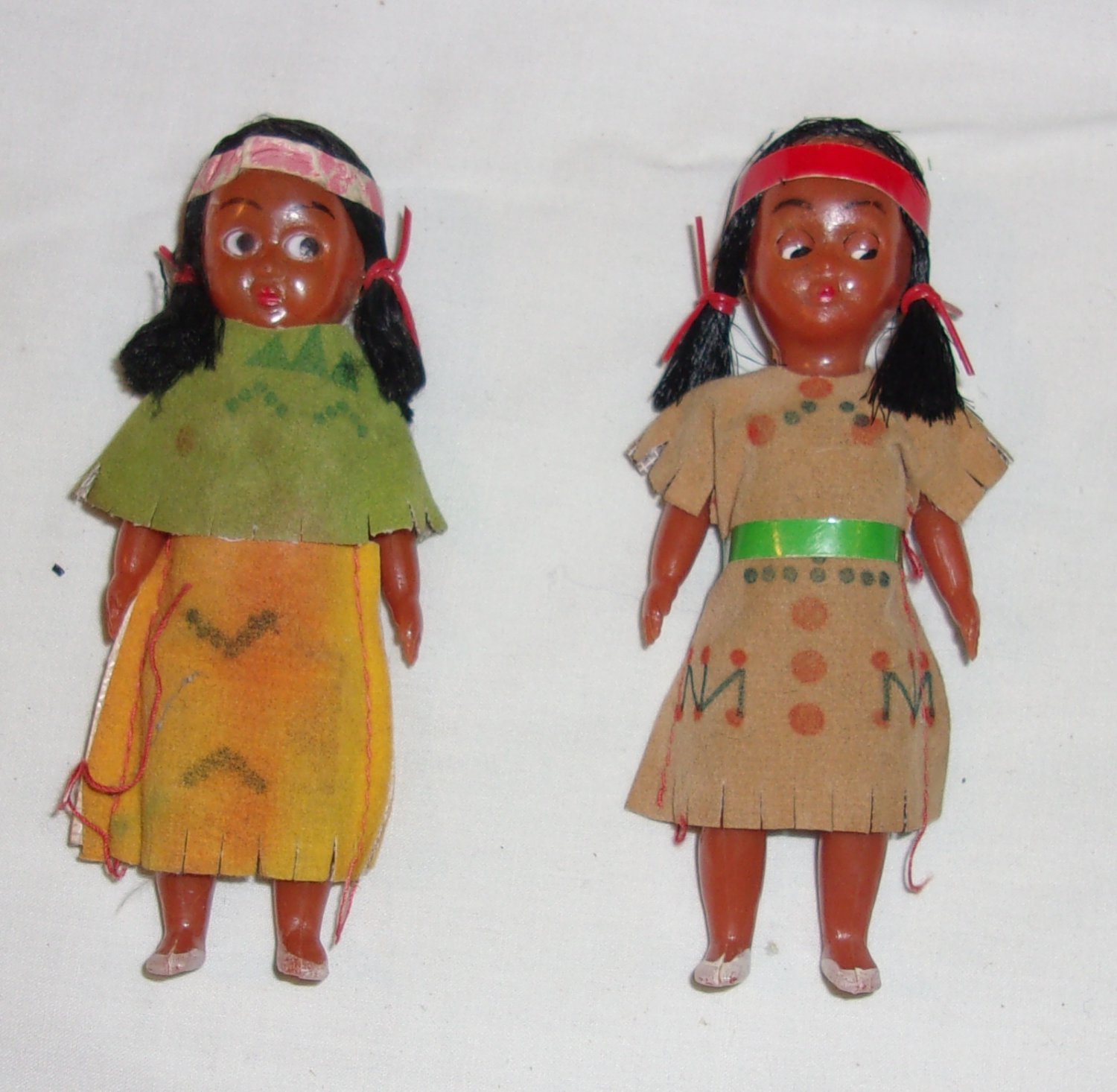 Vintage Indian Dolls pair Approximately 4 inches tall Celluloid?