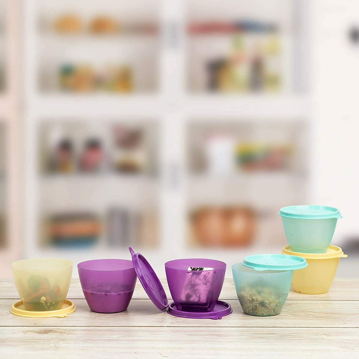 Tupperware Bowled cratchproof surface Air and liquid tight BPA free Leak proof