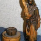 Hand carved water woman by well wood