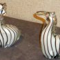 A Pair of Stylized Glass Zebra Sculptures
