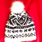Hand knit Nordic design hat with removable Pompom